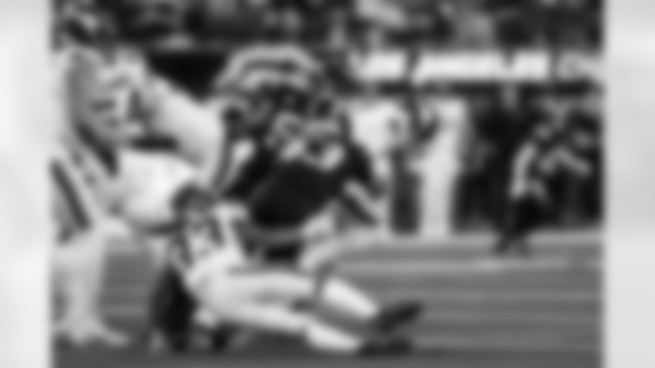OLB Khalil Mack (52) and LB Troy Dye (43)