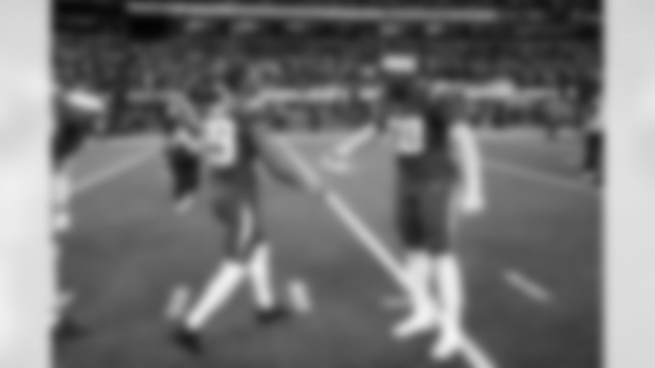 CB Tarheeb Still (29) and LB Marlowe Wax (58)