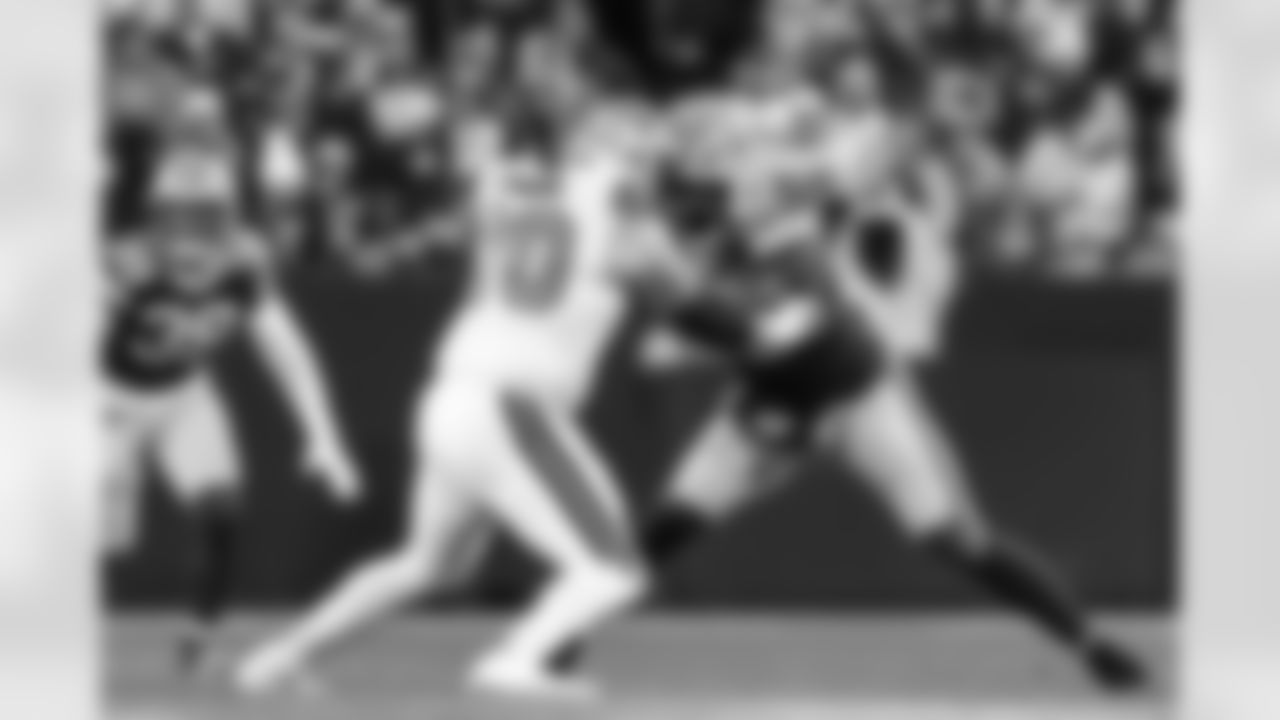 New Orleans Saints offensive tackle Trevor Penning (70) blocks Green Bay Packers defensive end Kingsley Enagbare (55) during an NFL football game, Monday, Dec. 23, 2024, in Green Bay, Wis. The Packers defeated the Saints 34-0. (Aaron M. Sprecher via AP)