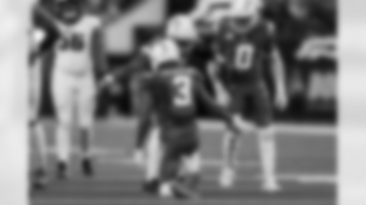 S Derwin James Jr. (3) and OLB Khalil Mack (52)