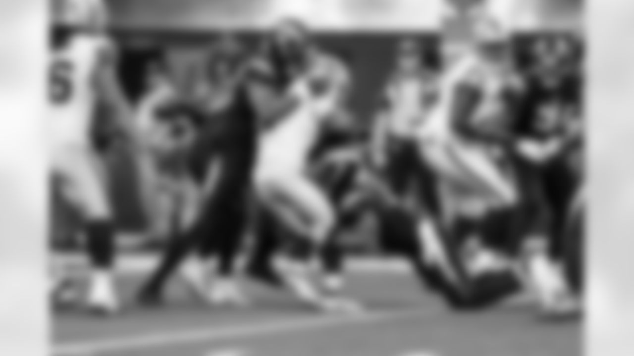 OLB Khalil Mack (52) and LB Denzel Perryman (6)