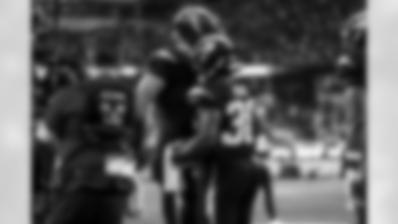C Bradley Bozeman (75) and RB Kimani Vidal (30)