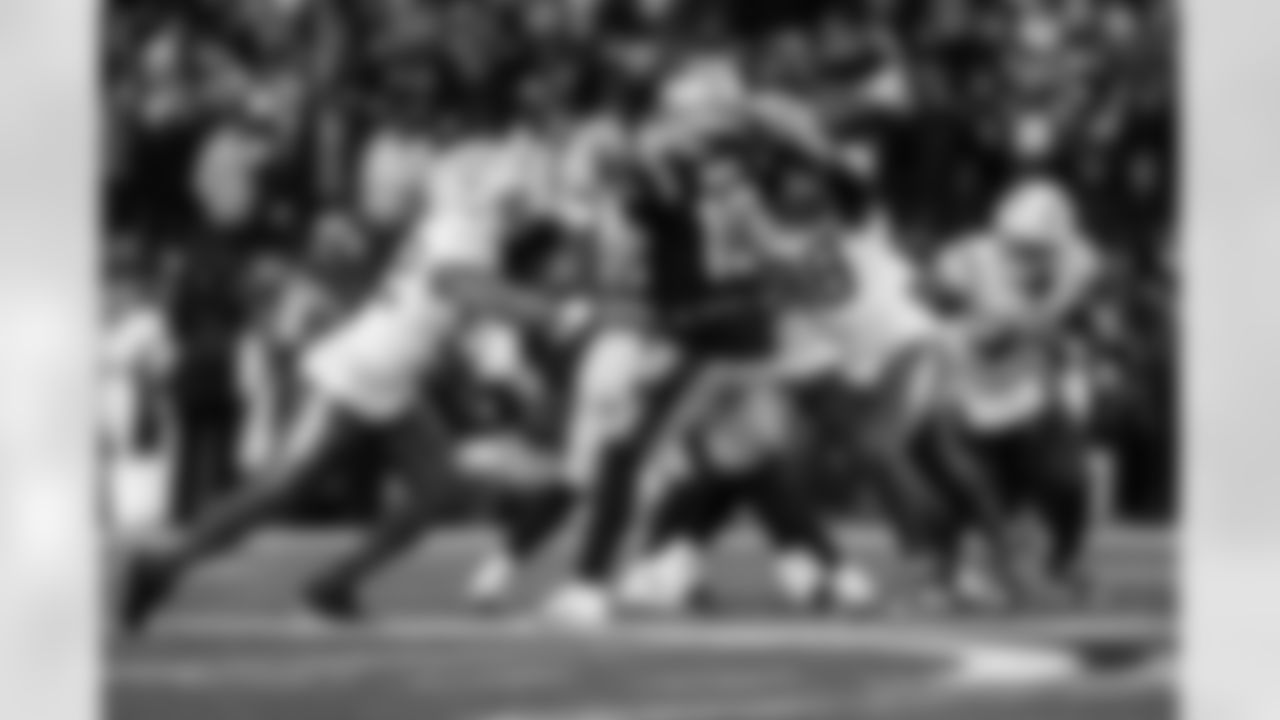 OLB Khalil Mack (52) and OLB Odafe Oweh (98)