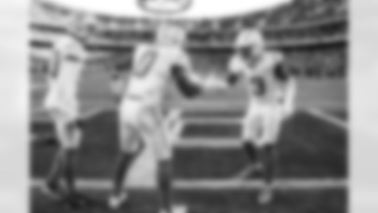 CB Cam Hart (20), LB Daiyan Henley (0) and S Derwin James Jr. (3)