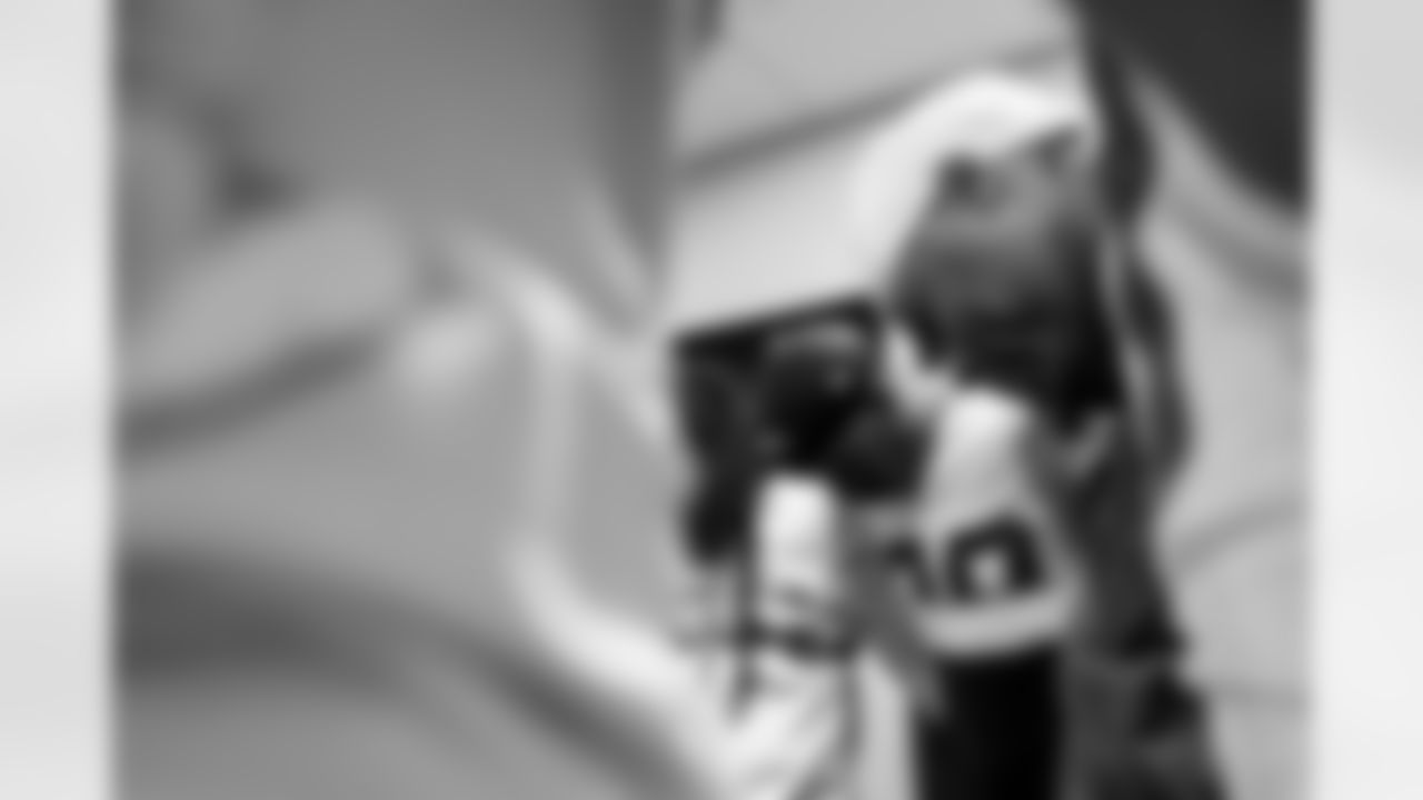 Check out the best shots from the Chargers Wild Card matchup against the Patriots!