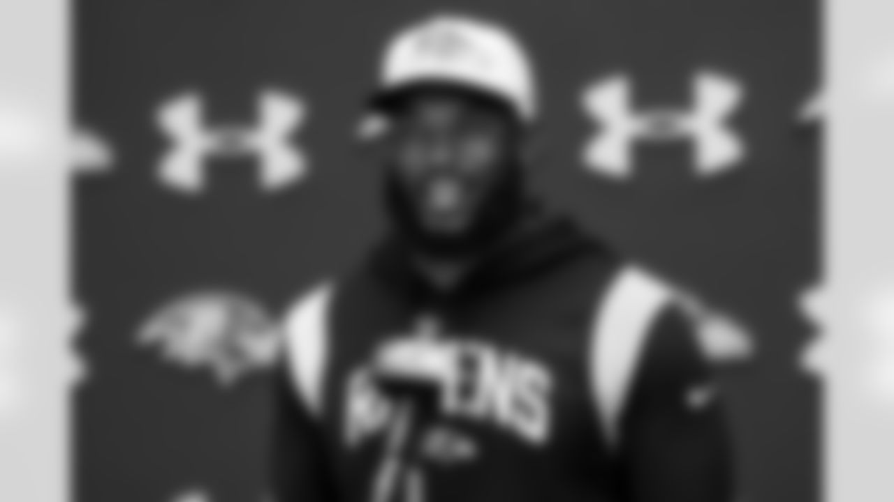 Baltimore Ravens defensive coordinator Zach Orr talks to the media after an NFL football practice, Thursday, May 23, 2024, in Owings Mills, Md. (AP Photo/Nick Wass)