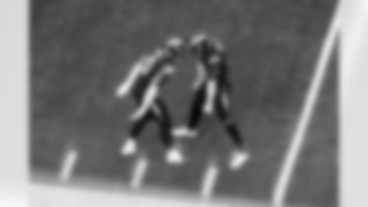 LB Daiyan Henley (0) and S Derwin James Jr. (3)