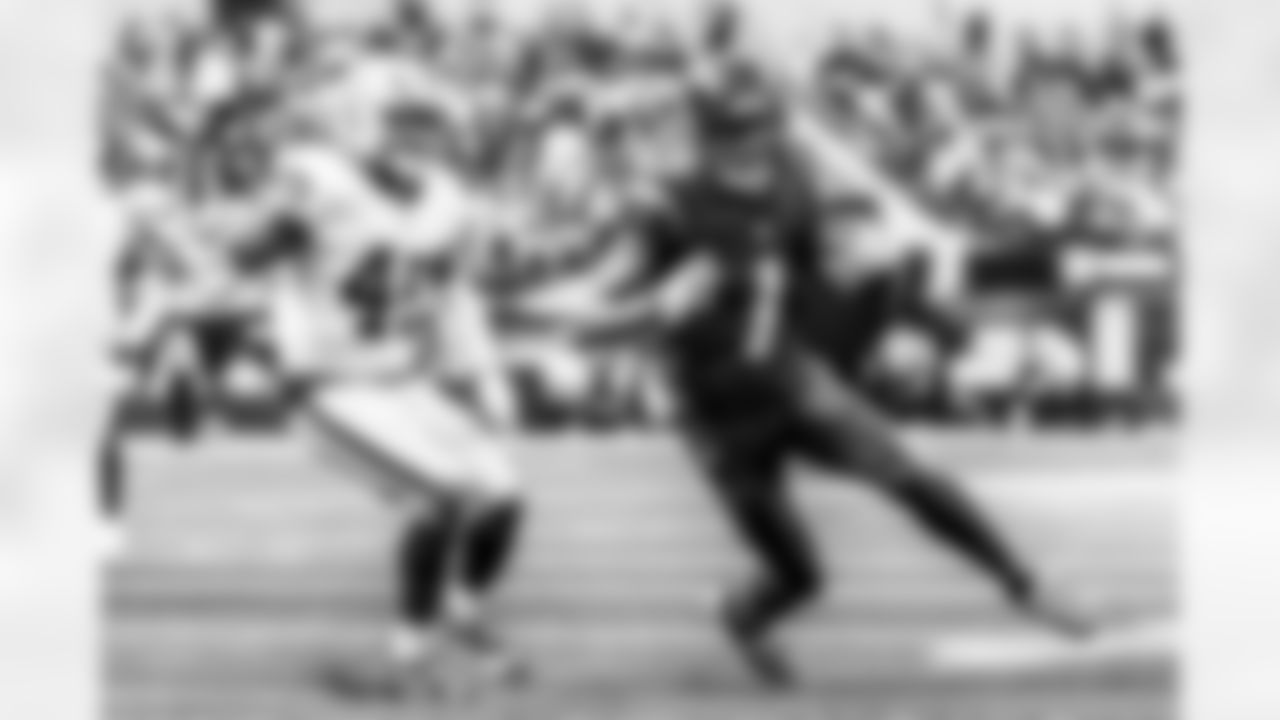 Take a look back at the Chargers Week 13 matchup with the Raiders in monochrome.