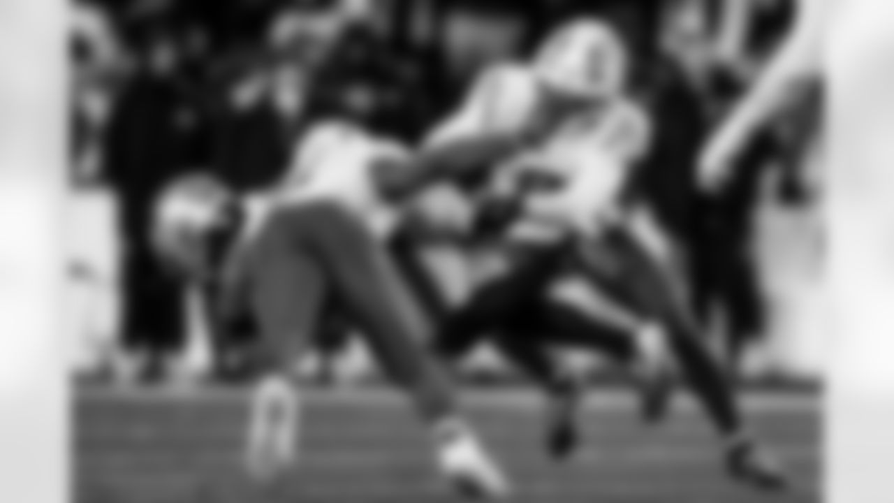 Check out the best shots from the Chargers Wild Card matchup against the Patriots!