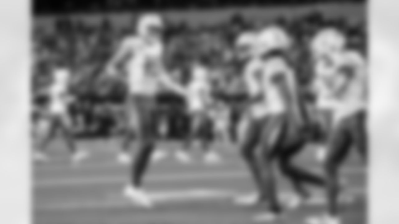 QB Justin Herbert (10) and WR Quentin Johnston (1)