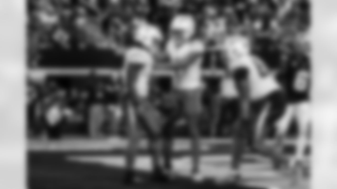 RB Omarion Hampton (8) and WR Quentin Johnston (1)