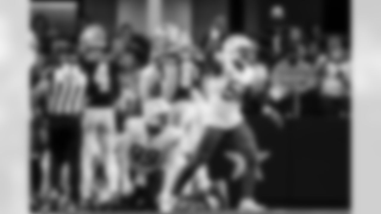 DT Jamaree Caldwell (99) and OLB Khalil Mack (52)