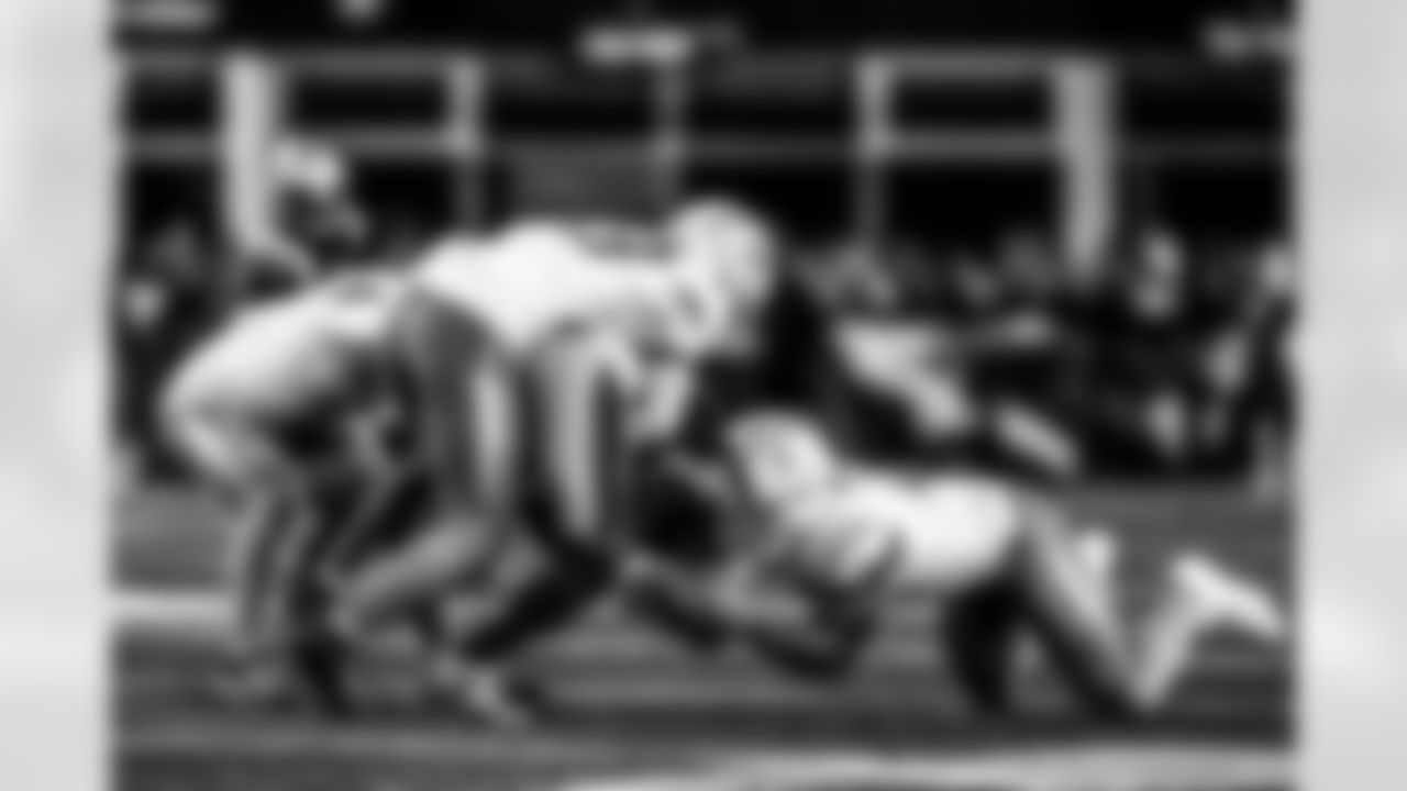 Take a look back at the Chargers Wild Card matchup with the Patriots in monochrome.