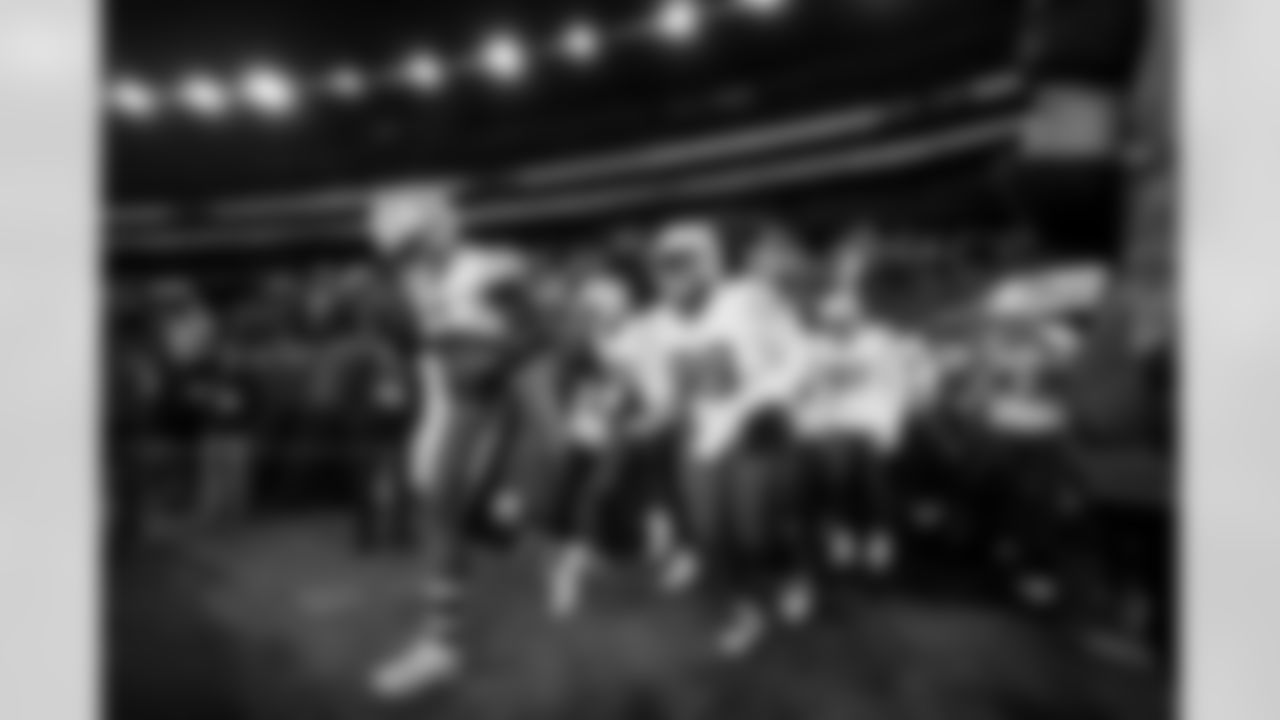 DT Jamaree Caldwell (99) and LB Denzel Perryman (6)