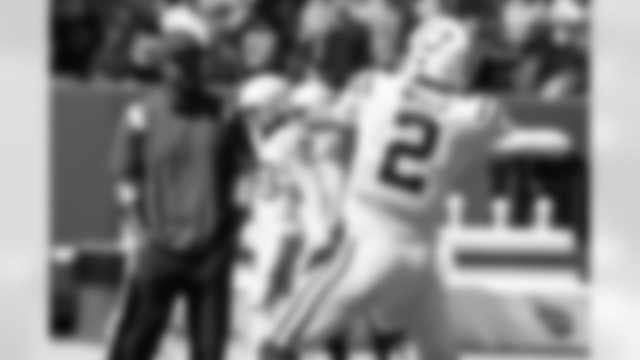 Indianapolis Colts offensive coordinator Marcus Brady watches quarterback Carson Wentz (2) before an NFL football game against the Tennessee Titans Sunday, Sept. 26, 2021, in Nashville, Tenn. (AP Photo/Mark Zaleski)