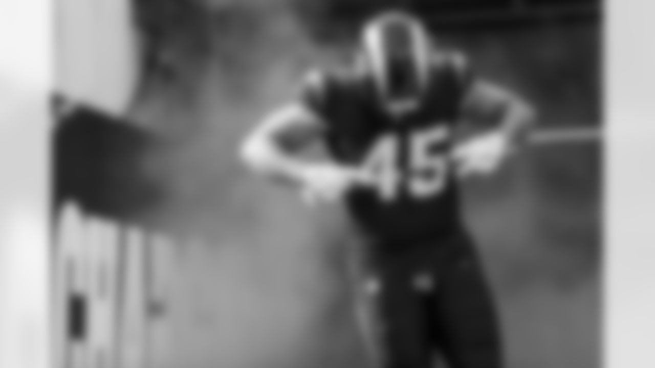 Take a look back at the best photos of Tuli Tuipulotu's 2025 campaign.