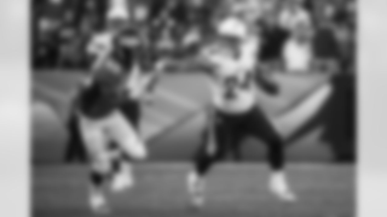 Relive the Chargers' postseason appearances through images from playoff games, highlighting the moments that defined the team in the NFL playoffs.