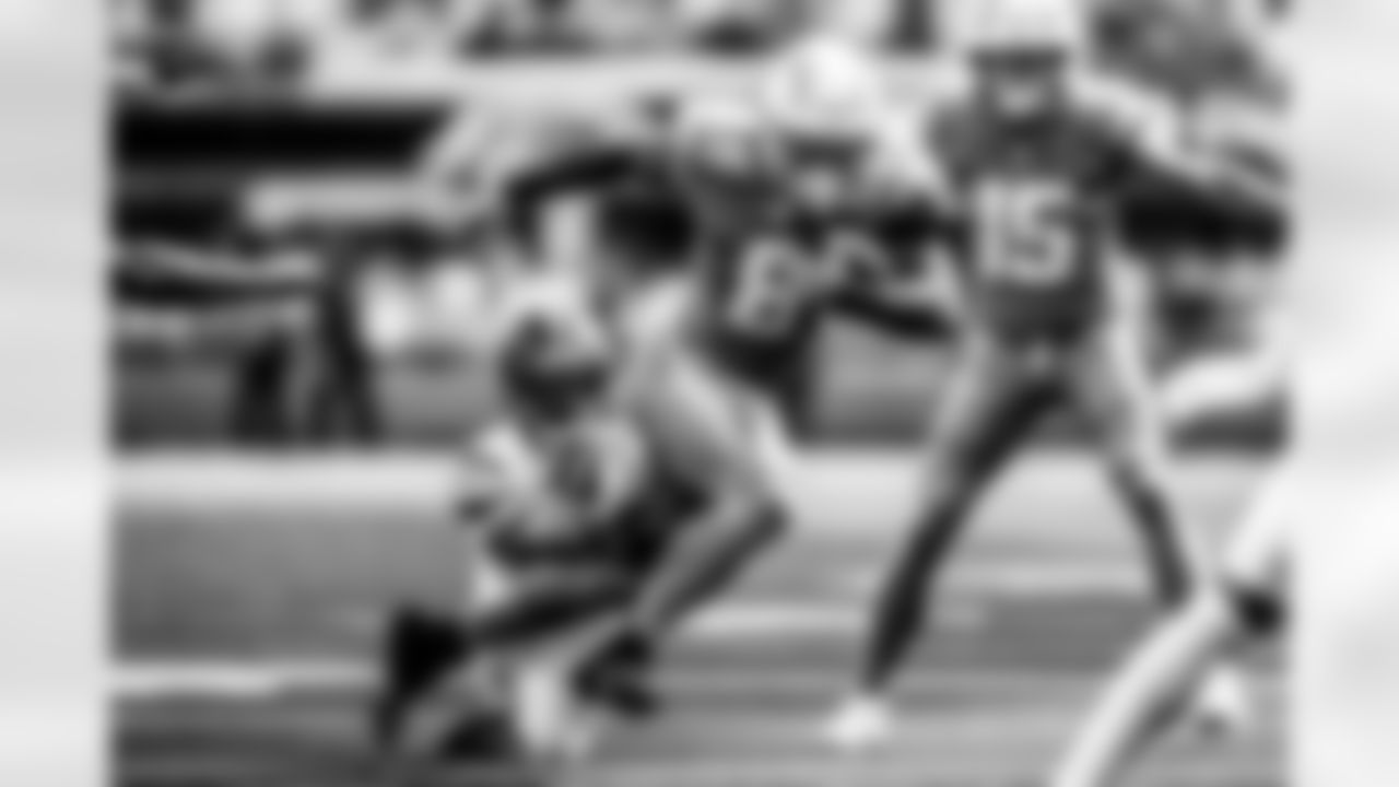 Take a look back at the Chargers Week 5 matchup with the Commanders in monochrome!