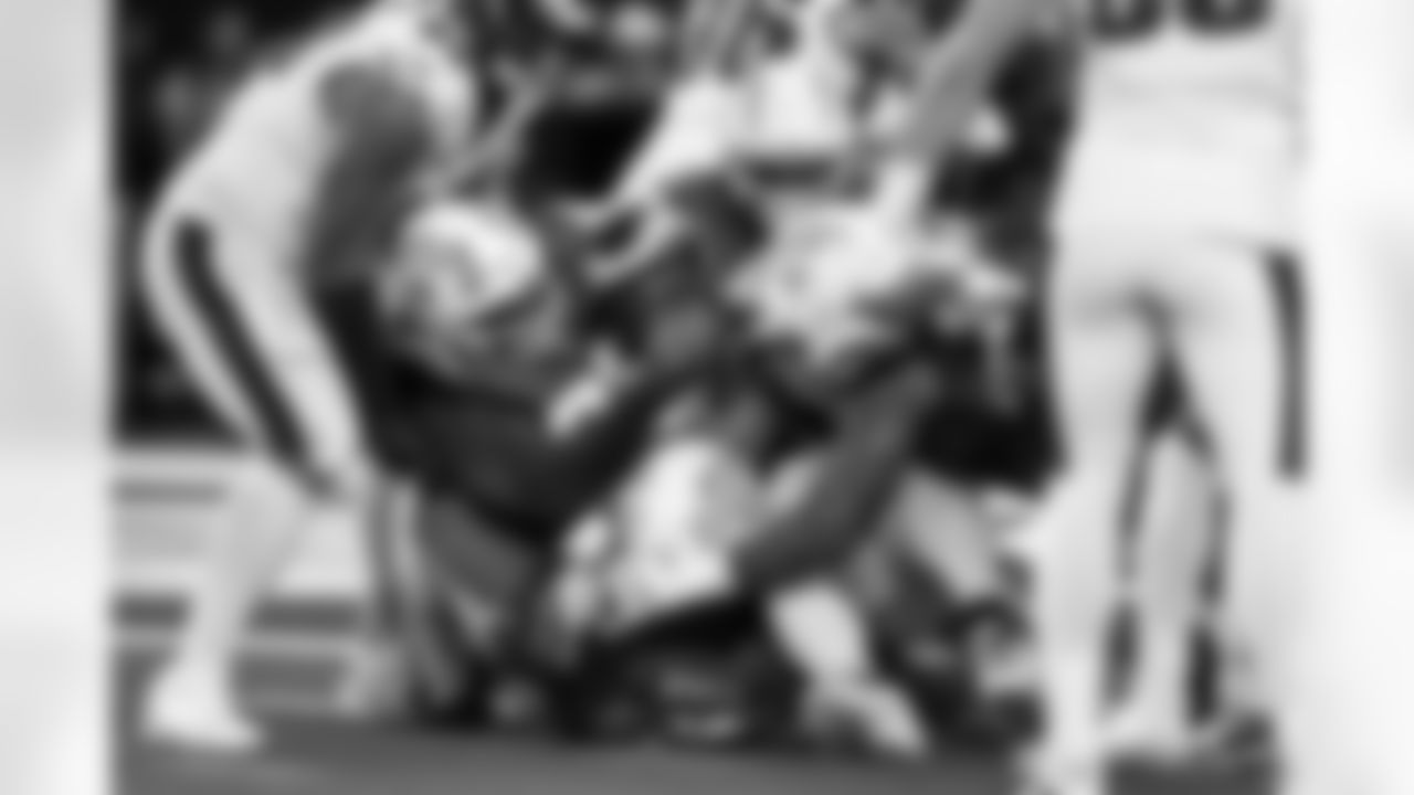 DL Teair Tart (90), OLB Khalil Mack (52) and DL Da'Shawn Hand (91)