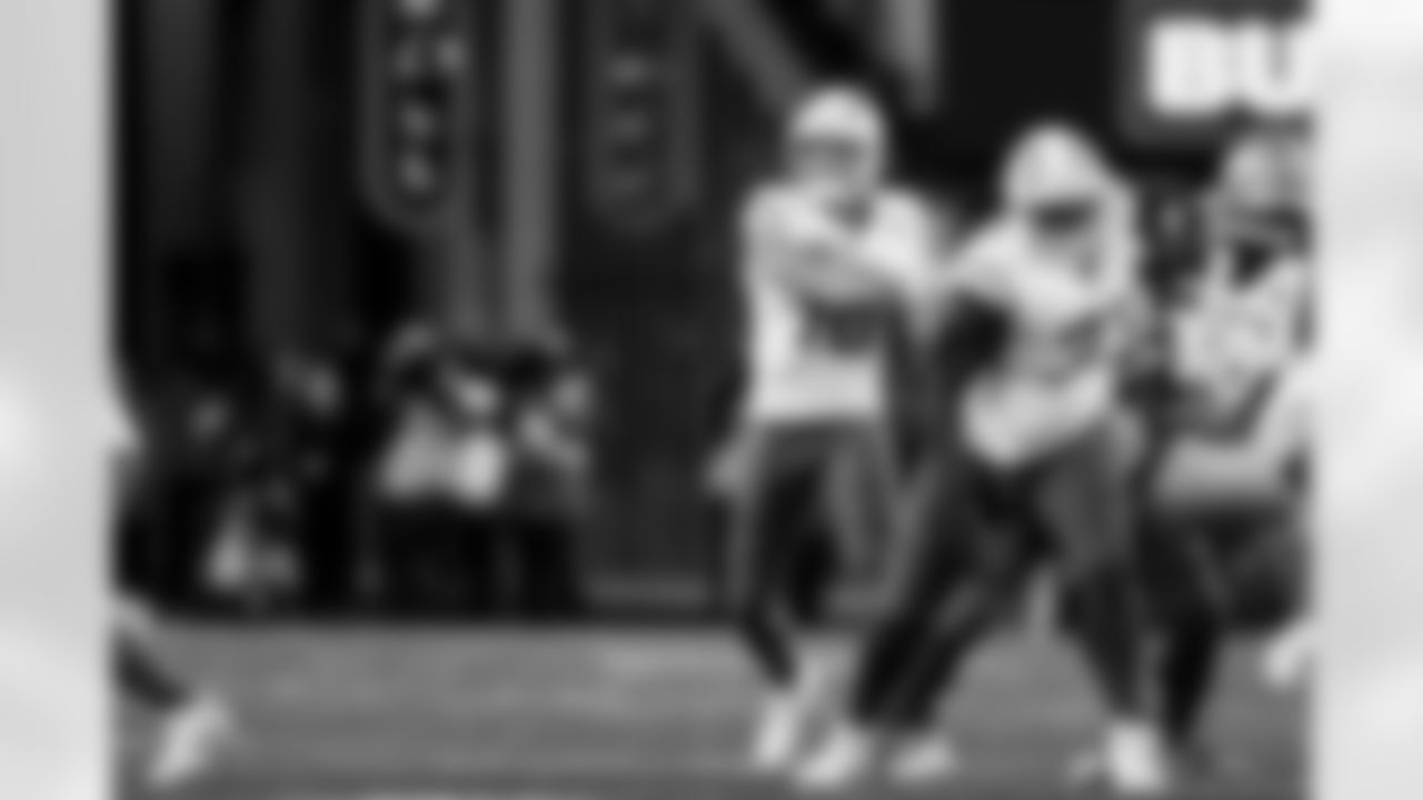 Check out the best shots from the Chargers Wild Card matchup against the Patriots!