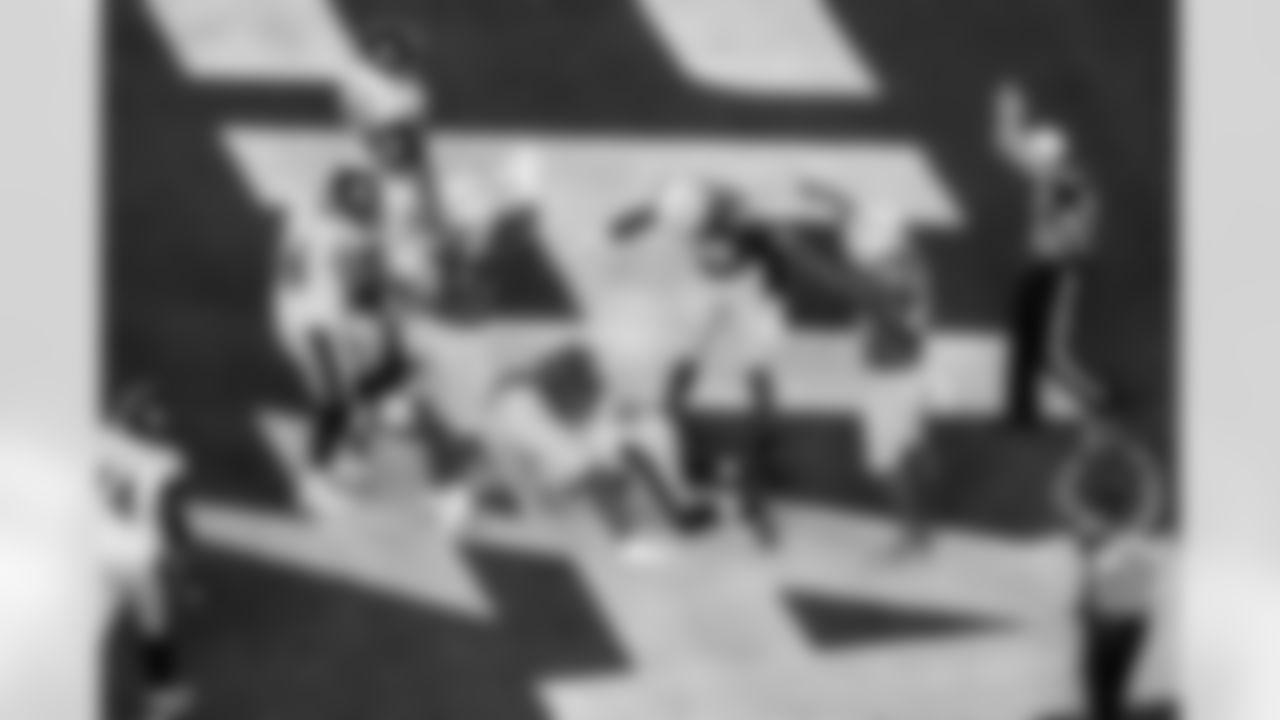 DL Da'Shawn Hand (91), OLB Odafe Oweh (98), OLB Tuli Tuipulotu (45) and OLB Khalil Mack (52)