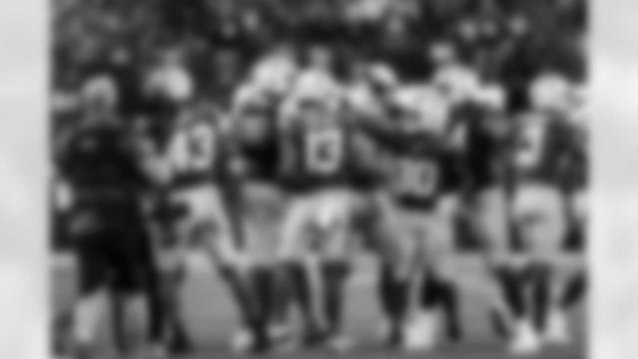 WR Keenan Allen (13), RB Kimani Vidal (30) and T Trey Pipkins III (79)