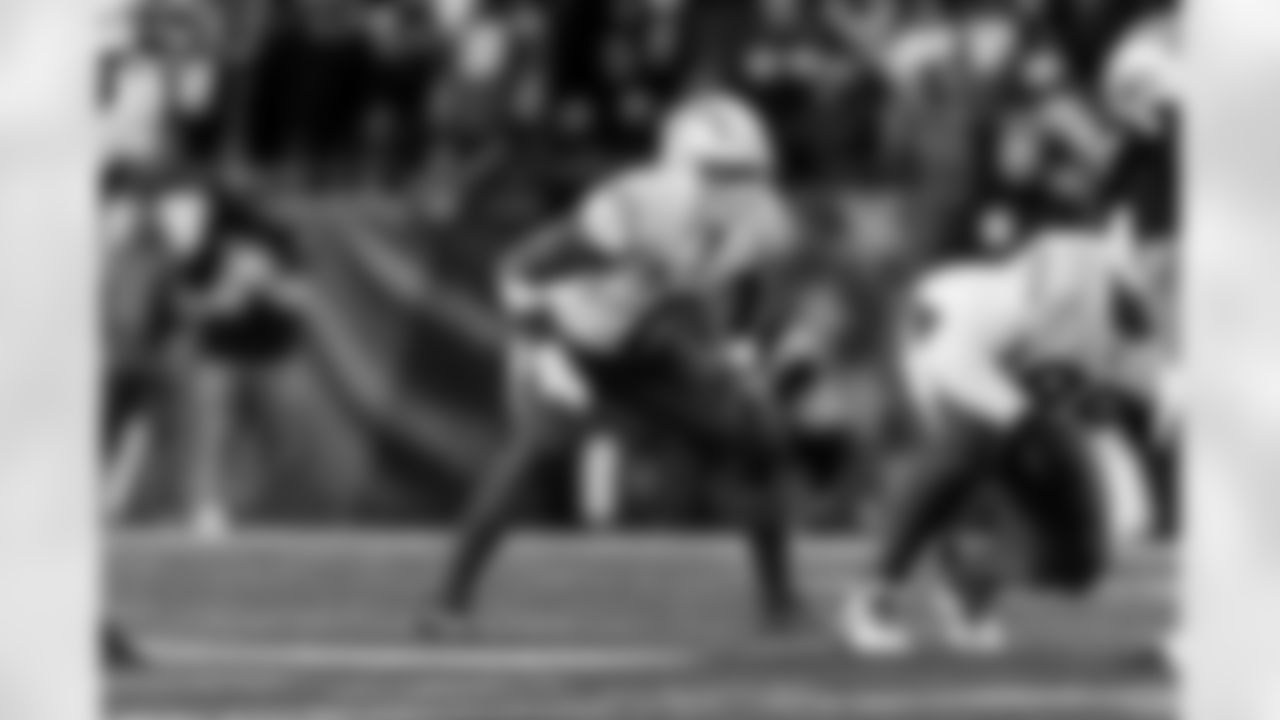 Check out the best shots from the Chargers Wild Card matchup against the Patriots!