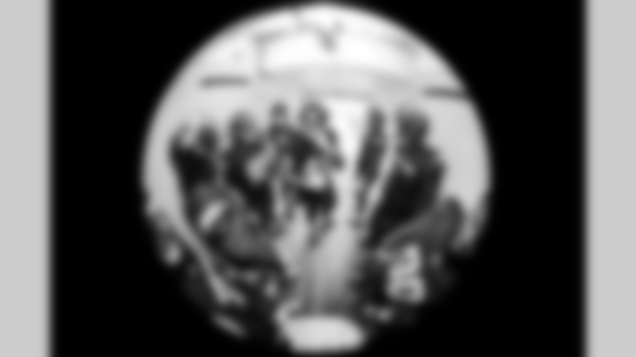 OLB Tuli Tuipulotu (45) and DL Teair Tart (90)