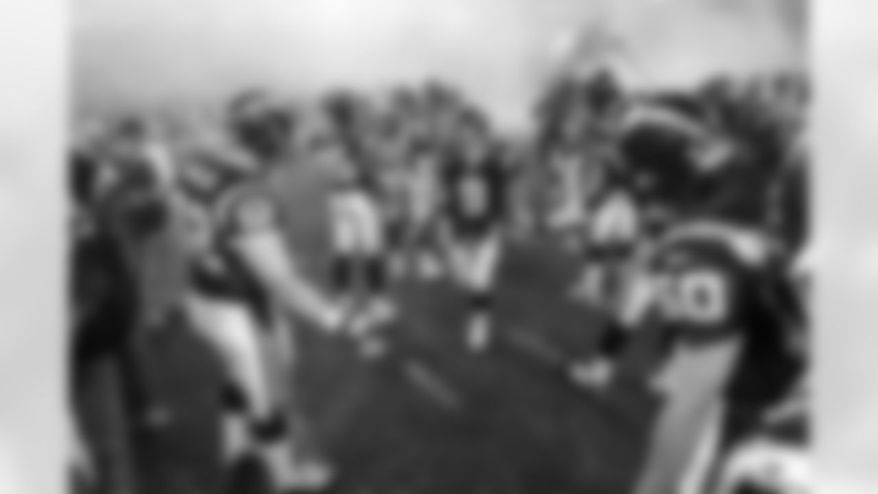 Relive the Chargers' postseason appearances through images from playoff games, highlighting the moments that defined the team in the NFL playoffs.