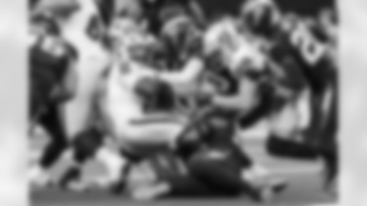 S Tony Jefferson (23), OLB Khalil Mack (52) and CB Cam Hart (20)