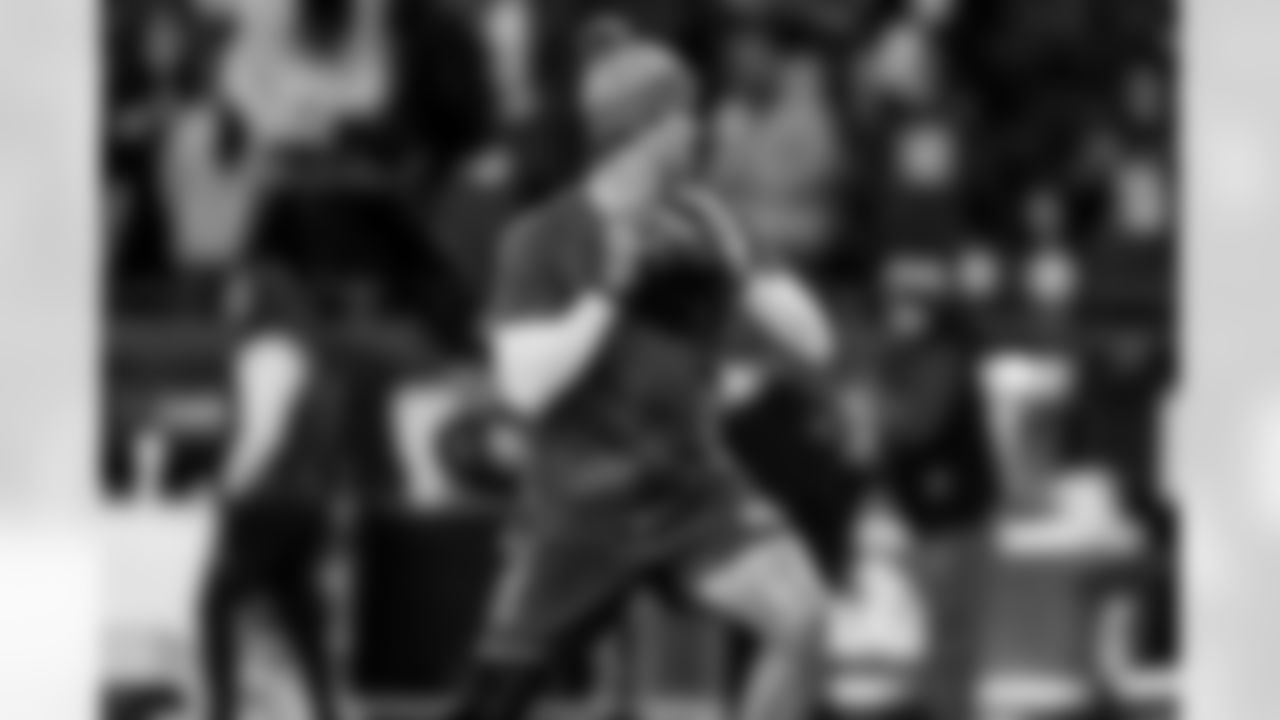 Check out the best shots from the Chargers Wild Card matchup against the Patriots!