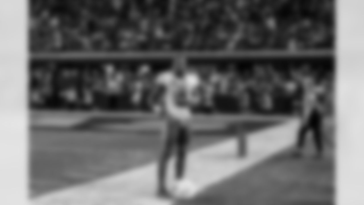 Seatbelt - The Bolts defense put on a show in primetime at Allegiant Stadium with three interceptions on the night. After shutting the Raiders out of the endzone once again with a pass breakup that led to an interception, Derwin James, Jr. came strutting off the field, dropped his helmet and then hit the 'Seatbelt' celebration before Coach Jim Harbaugh came over and high-fived him. Shooting it wide really gives a chance to show the Chargers fans celebrating and taking over the Raiders house.