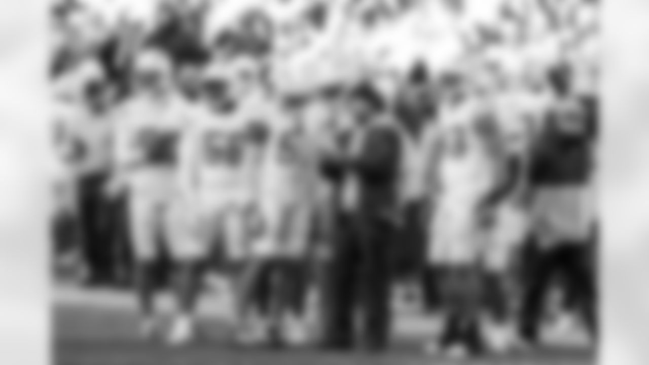 LB Marlowe Wax (58), Special Teams Coordinator Ryan Ficken, LB Troy Dye (43), Dr. Ed Cheung and LB Del'Shawn Phillips (53)