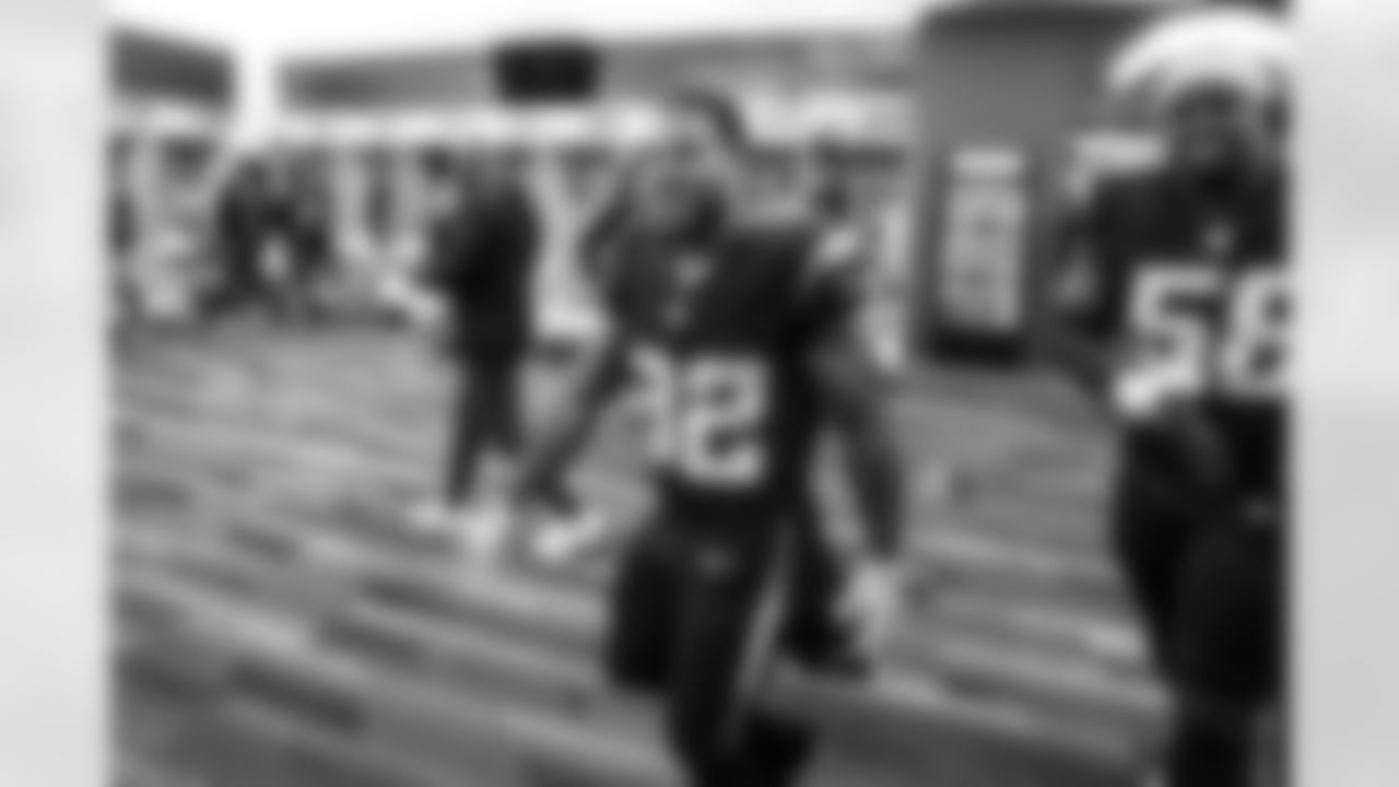 RB Jaret Patterson (32) and LB Marlowe Wax (58)