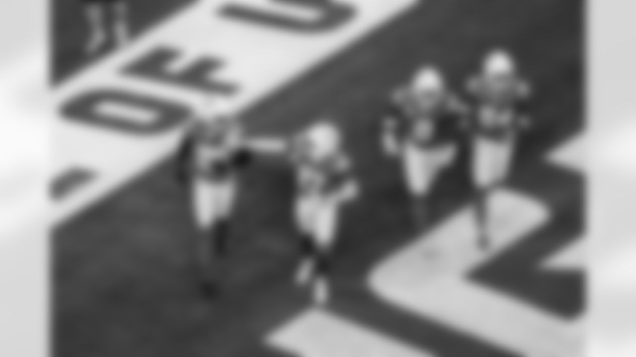 CB Cam Hart (20), S RJ Mickens (27), LB Daiyan Henley (0) and CB Benjamin St-Juste (24)