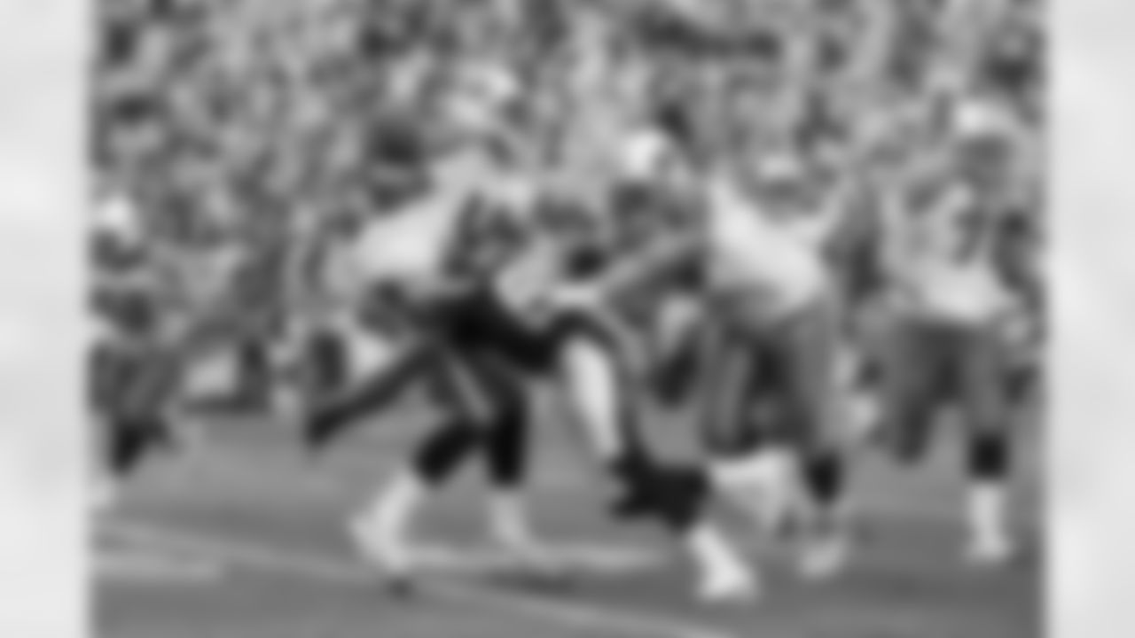 Relive the Chargers' postseason appearances through images from playoff games, highlighting the moments that defined the team in the NFL playoffs.