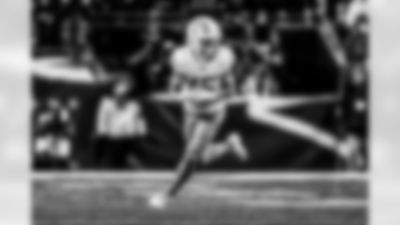 Take a look back at the Chargers Wild Card matchup with the Patriots in monochrome.