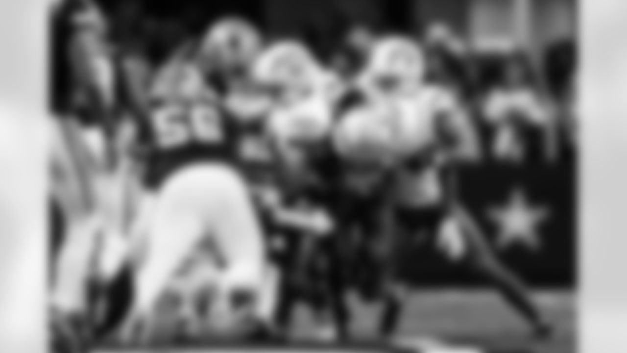 OLB Khalil Mack (52), CB Benjamin St-Juste (24) and S Marcus Williams (31)