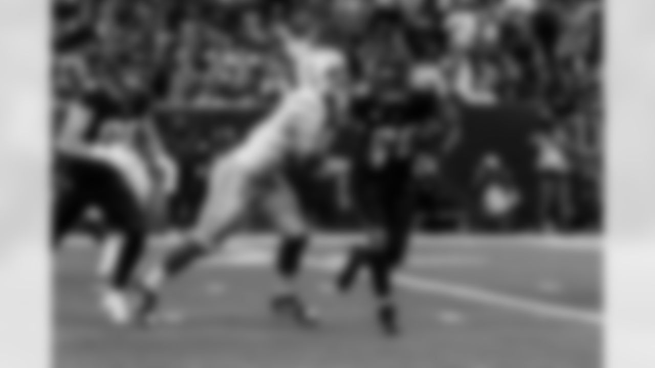 Check out the best shots from the Chargers Wild Card matchup against the Texans!