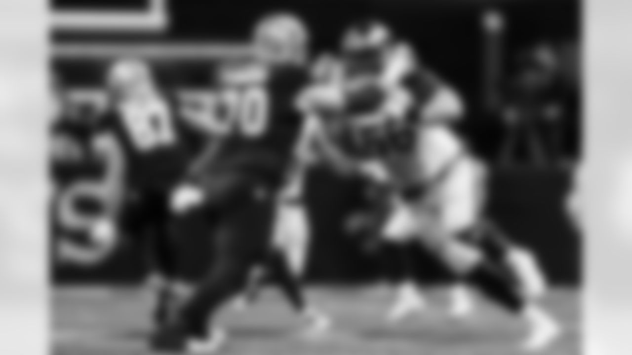 New Orleans Saints offensive tackle Trevor Penning (70) blocks Los Angeles Rams defensive tackle Braden Fiske (55) during an NFL football game, Sunday, Dec. 01, 2024, in New Orleans. The Rams defeated the Saints 21-14. (Aaron M. Sprecher via AP)