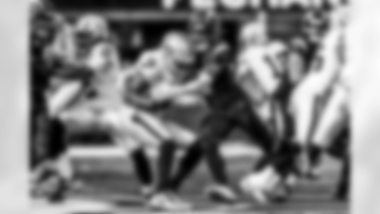 Take a look back at the Chargers Week 13 matchup with the Raiders in monochrome.