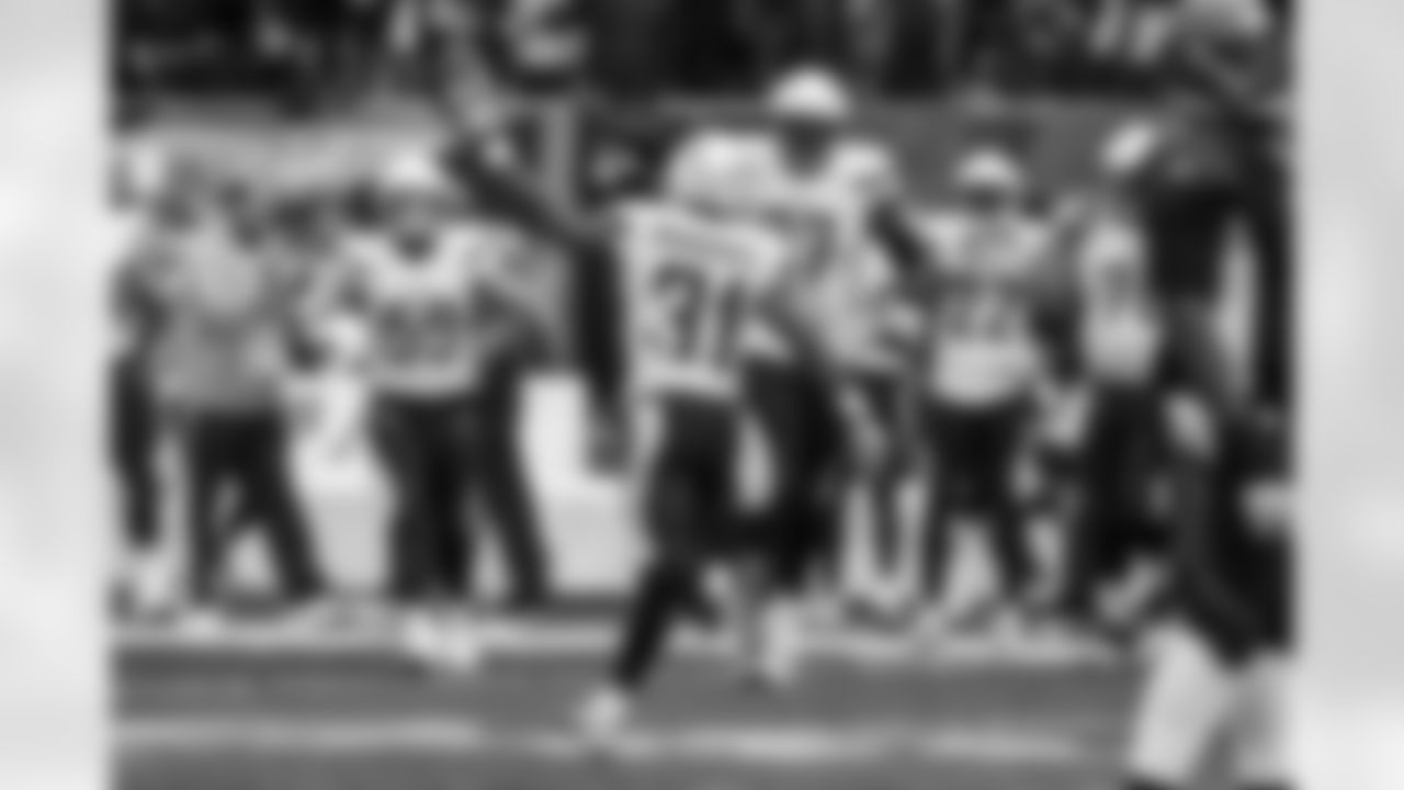 Relive the Chargers' postseason appearances through images from playoff games, highlighting the moments that defined the team in the NFL playoffs.