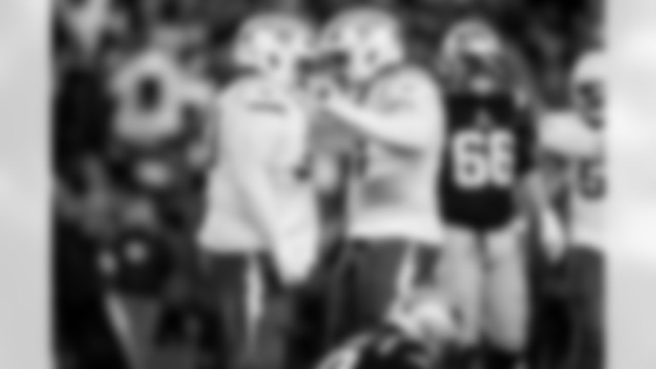 Check out the best shots from the Chargers Wild Card matchup against the Patriots!