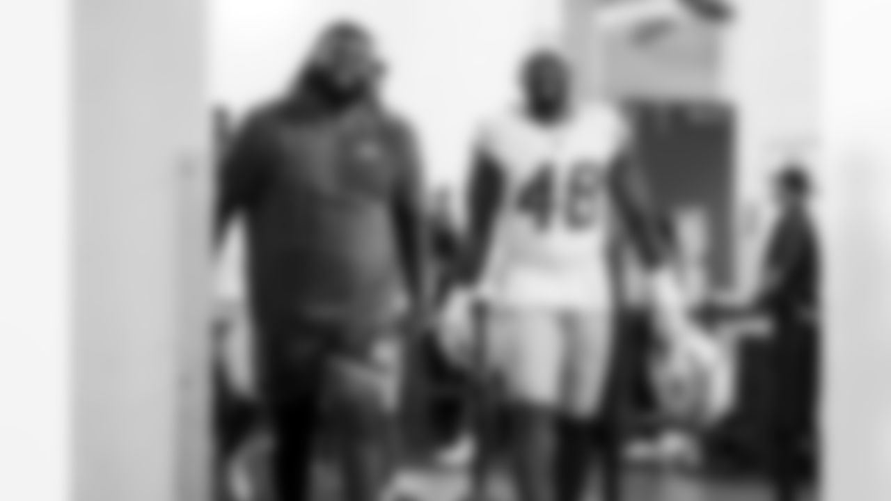 OL Jamaree Salyer (68) and OLB Bud Dupree (48)