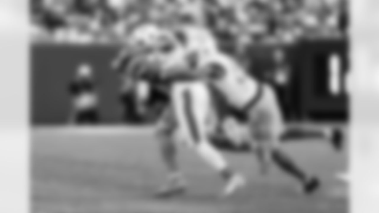 S Marcus Maye (35) and LB Del'Shawn Phillips (53)