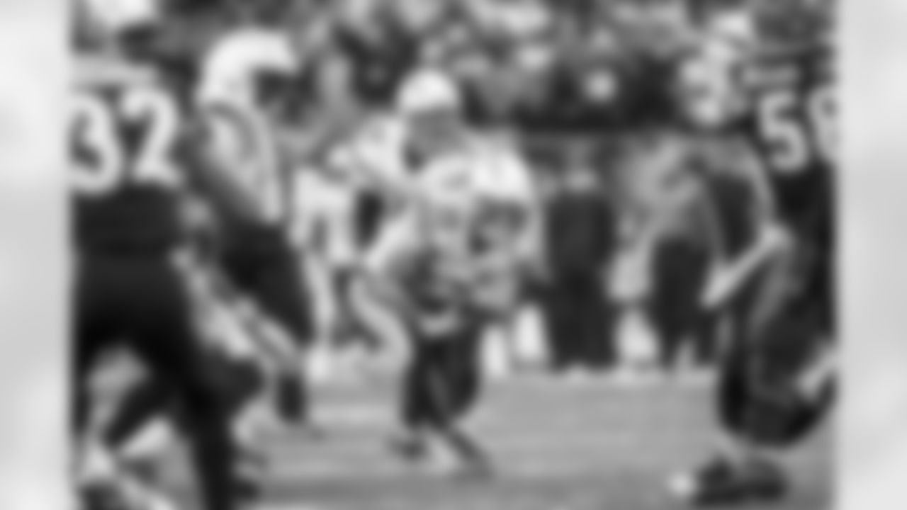 Relive the Chargers' postseason appearances through images from playoff games, highlighting the moments that defined the team in the NFL playoffs.