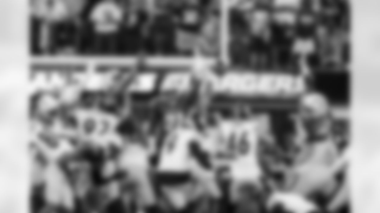 DL Da'Shawn Hand (91), OLB Tuli Tuipulotu (45) and DL Naquan Jones (96)