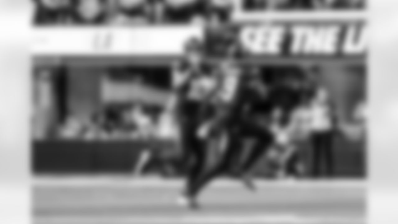 QB Justin Herbert (10) and WR Tre Harris (9)