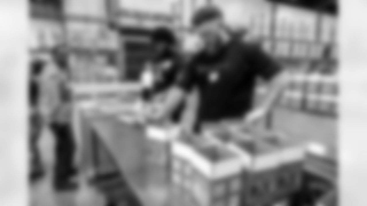 The Los Angeles Chargers participate in a SYNC Snack Box Packaging Event on Monday, June 2, 2025 at LA Regional Food Bank in Los Angeles, CA.