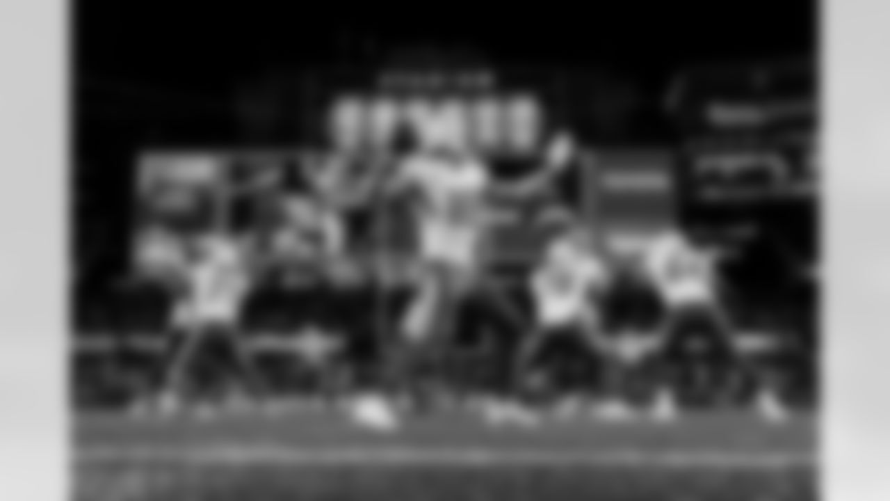 Check out the best shots from the Chargers Wild Card matchup against the Patriots!